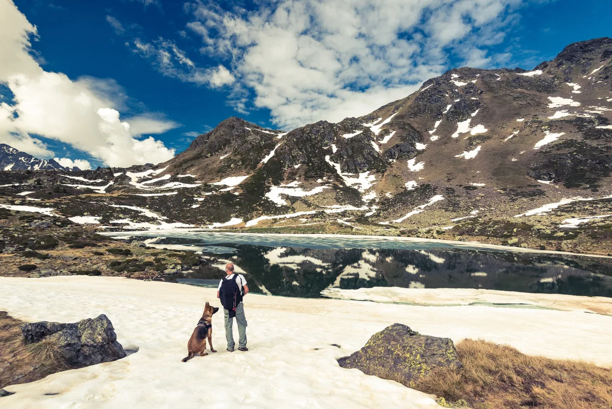 Adorra mountains, hikker and dog